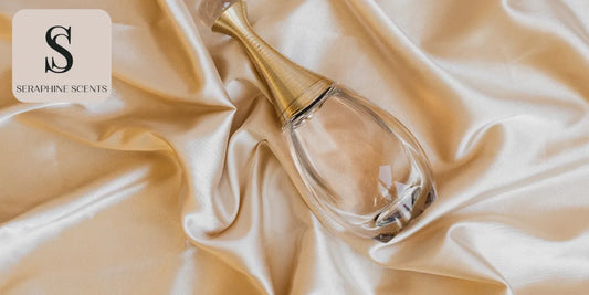 Perfume bottle on luxurious golden satin fabric — Fragrance Layering Mistakes to Avoid