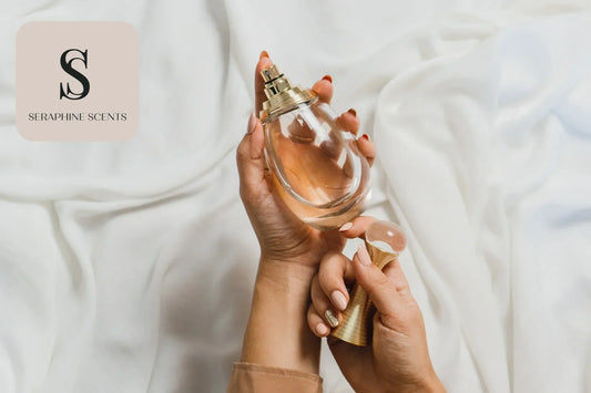 Elegant hands holding a perfume bottle - fragrances and perfumes guide by Seraphine Scents