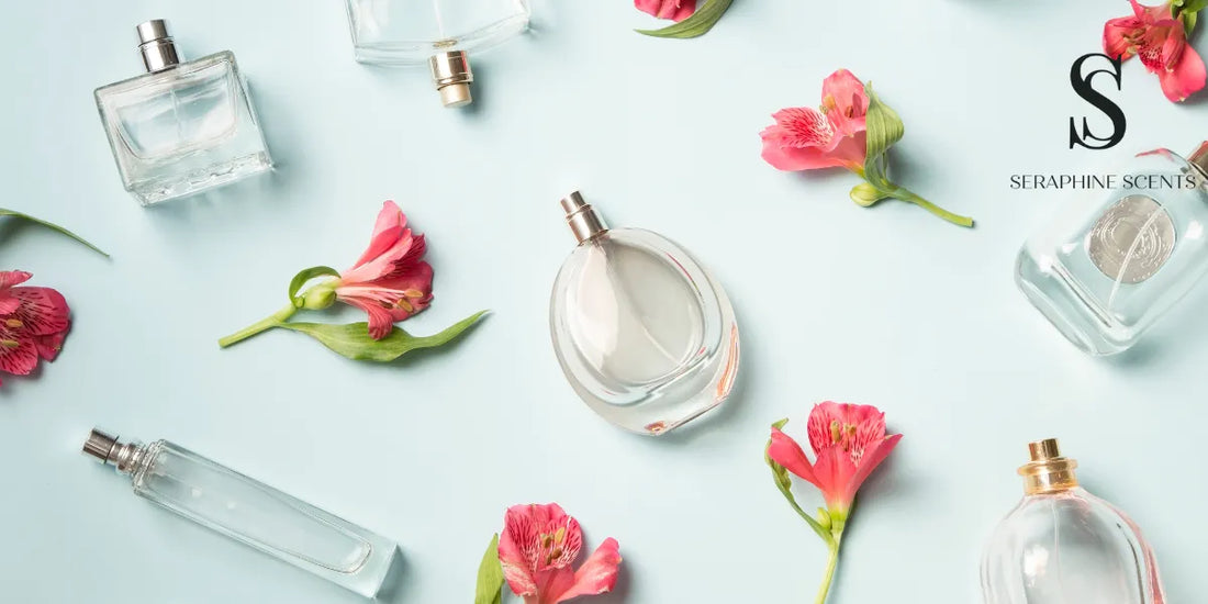 Flat lay of perfume, body mist, and cologne bottles with pink flowers — Seraphine Scents blog visual