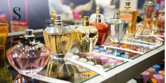 Perfume display in a Singapore fragrance shop showing designer bottles with Seraphine Scents watermark