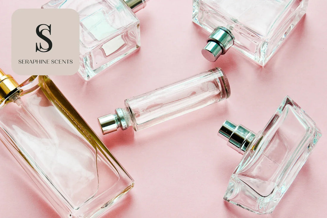 Clear perfume bottles on a pink background with Seraphine Scents branding — representing luxury fragrances in Singapore.