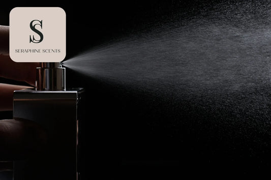 Perfume bottle spraying a fine mist against a dark background — Seraphine Scents fragrance imagery