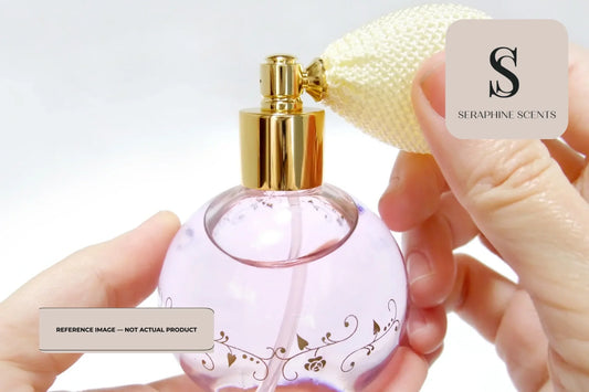 Creed Centaurus perfume bottle close up with gold atomizer and elegant lavender glass design