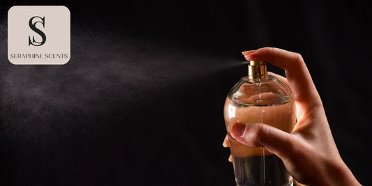Perfume being sprayed from a glass bottle with Seraphine Scents logo — blog on how signature aromas are crafted