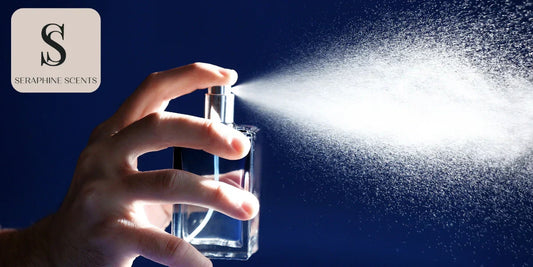 Hand spraying perfume into the air with Seraphine Scents logo
