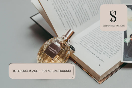Jo Malone Jasmine Sambac and Marigold Cologne Intense perfume bottle styled with book background