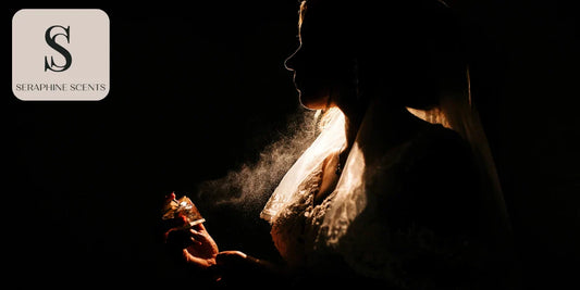 A woman spraying perfume in low light, symbolizing memory and mood
