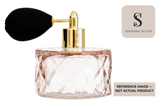 Xerjoff More Than Words Perfume Singapore reference image featuring a luxury clear glass perfume bottle with a vintage-style black atomiser bulb and gold spray hardware.